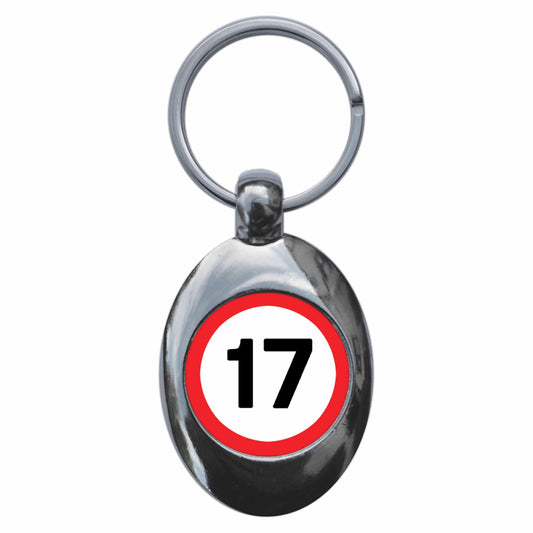 A picture of the front of the product, titled 17th Seventeenth Birthday MPH Road Sign Metal Keyring With Trolley Coin
