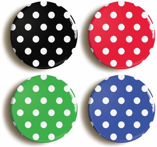 A picture of a set of four badges