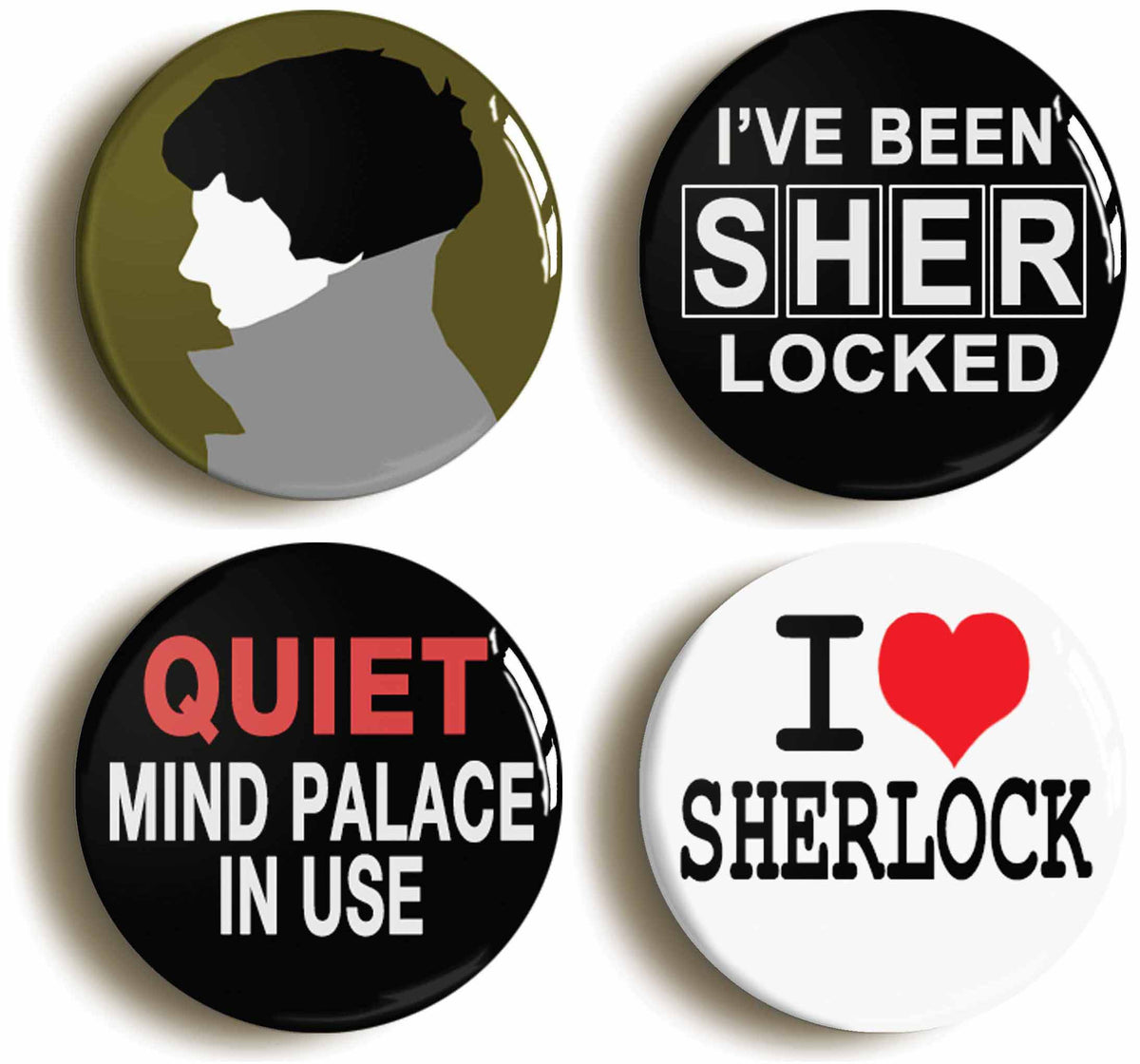A picture of a set of four badges