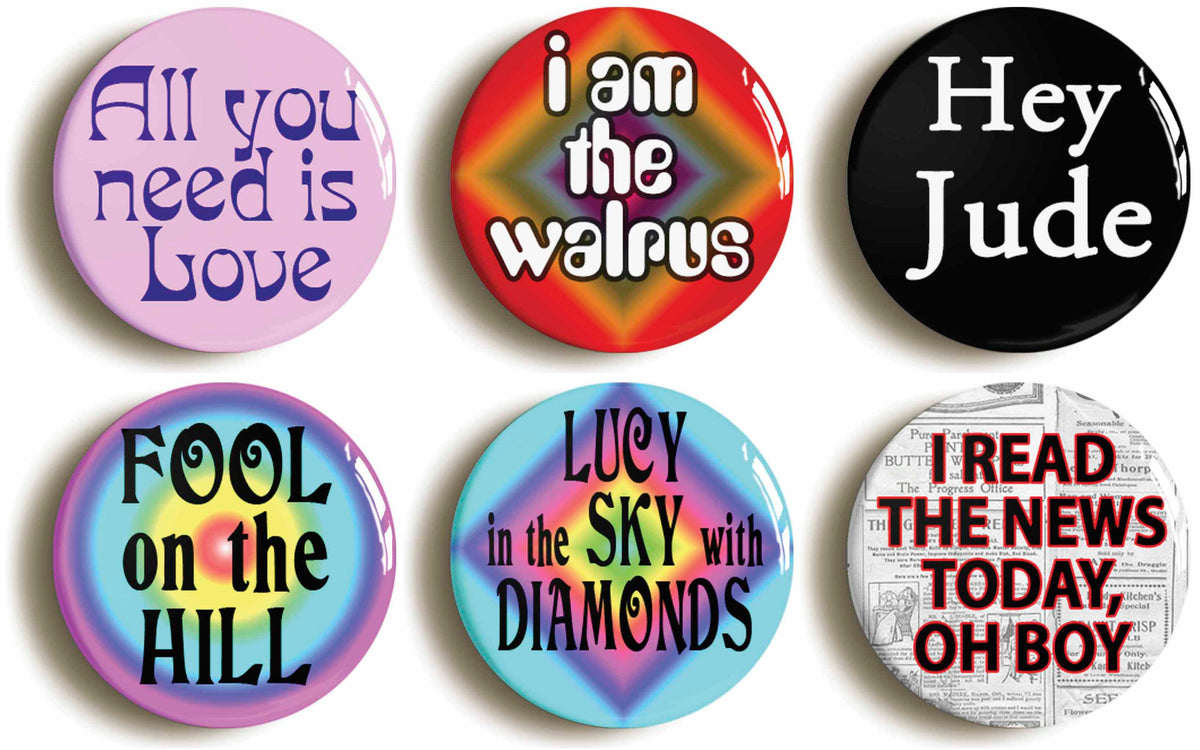 A picture of a set of six badges