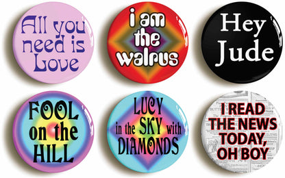 A picture of a set of six badges