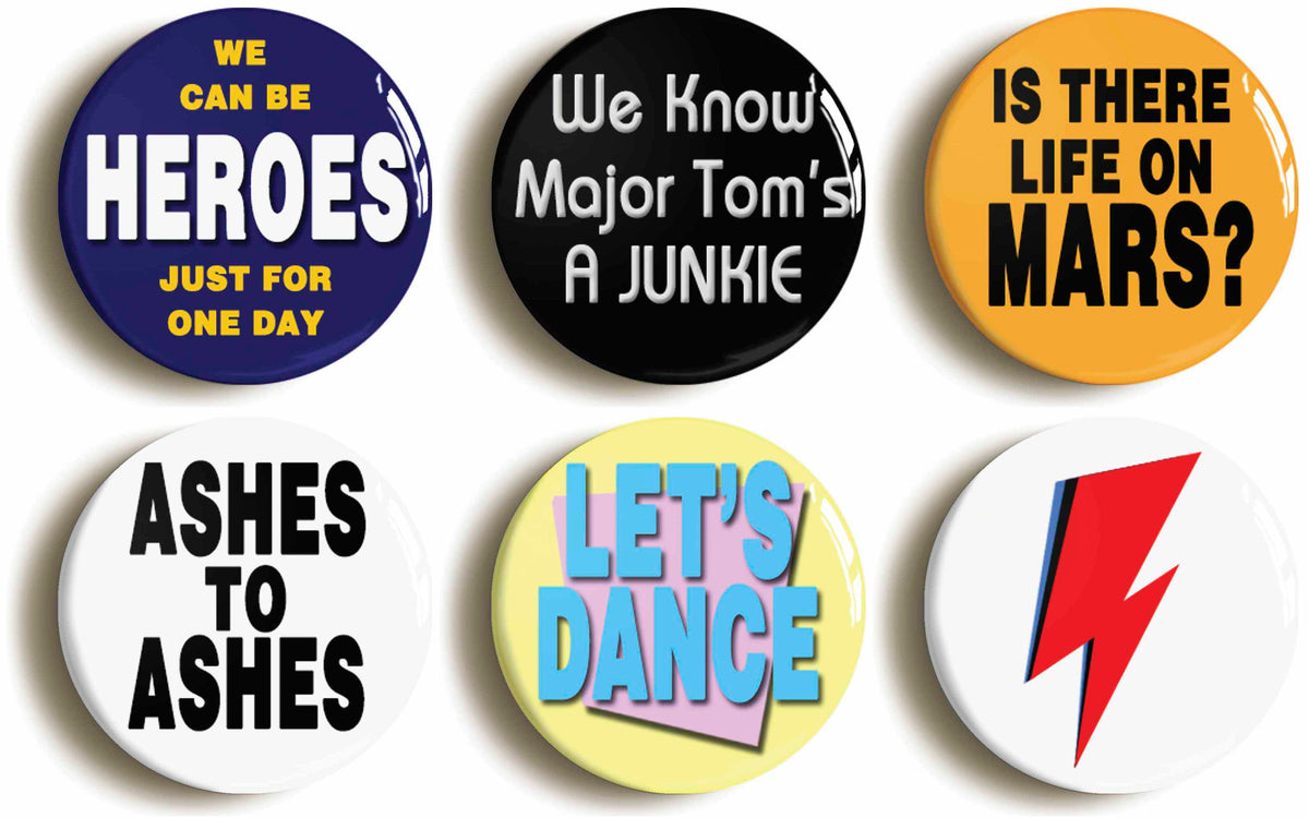 A picture of a set of six badges