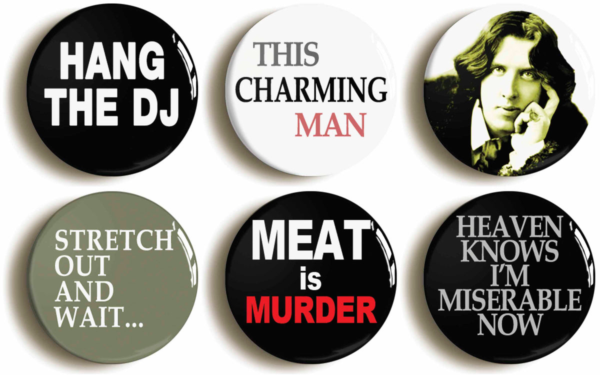 A picture of a set of six badges