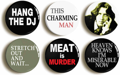 A picture of a set of six badges