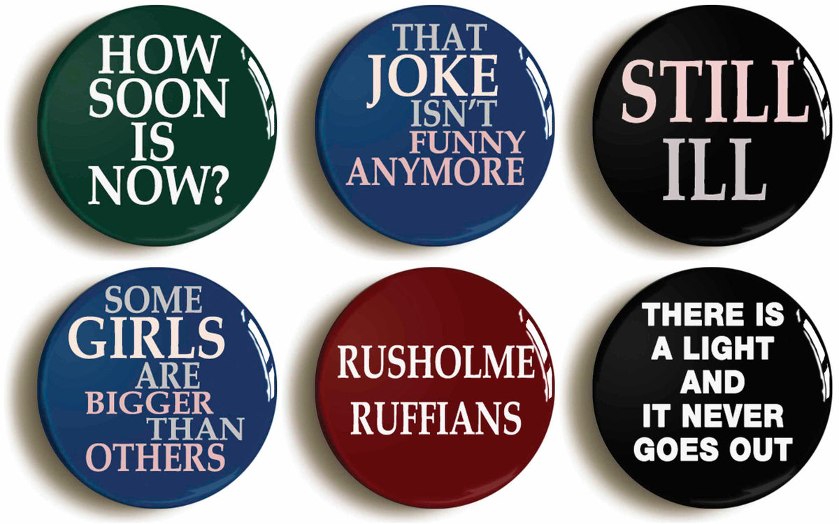 A picture of a set of six badges