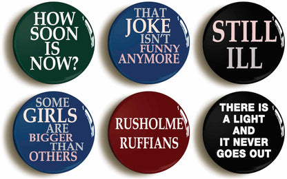 A picture of a set of six badges