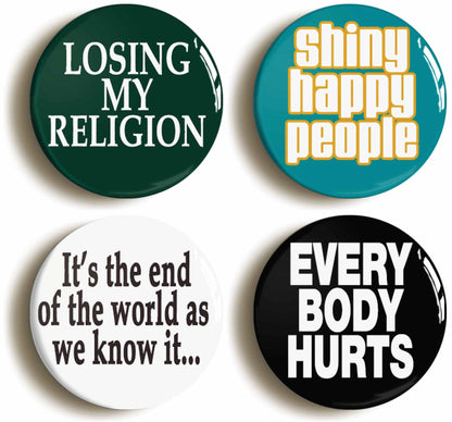 A picture of a set of four badges