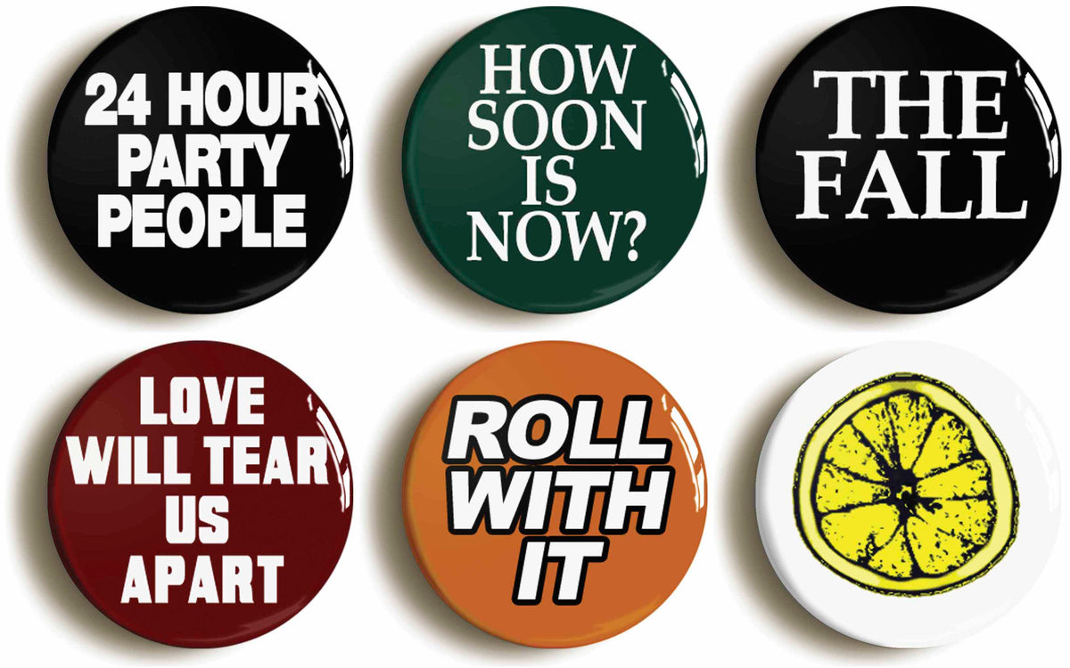 A picture of a set of six badges