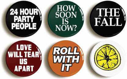 A picture of a set of six badges