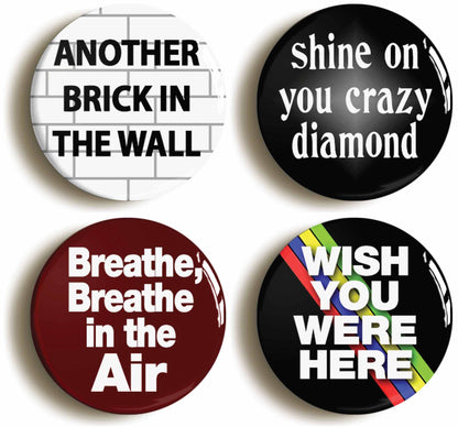 A picture of a set of four badges