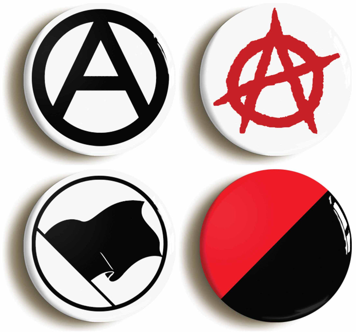 A picture of a set of four badges