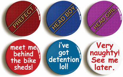 A picture of a set of six badges