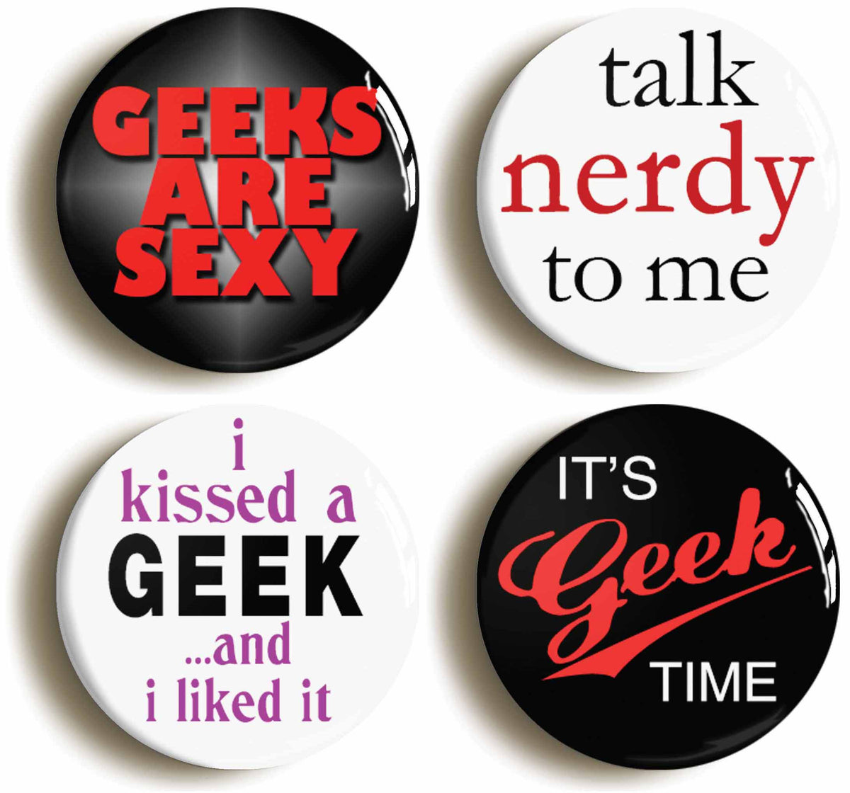 A picture of a set of four badges
