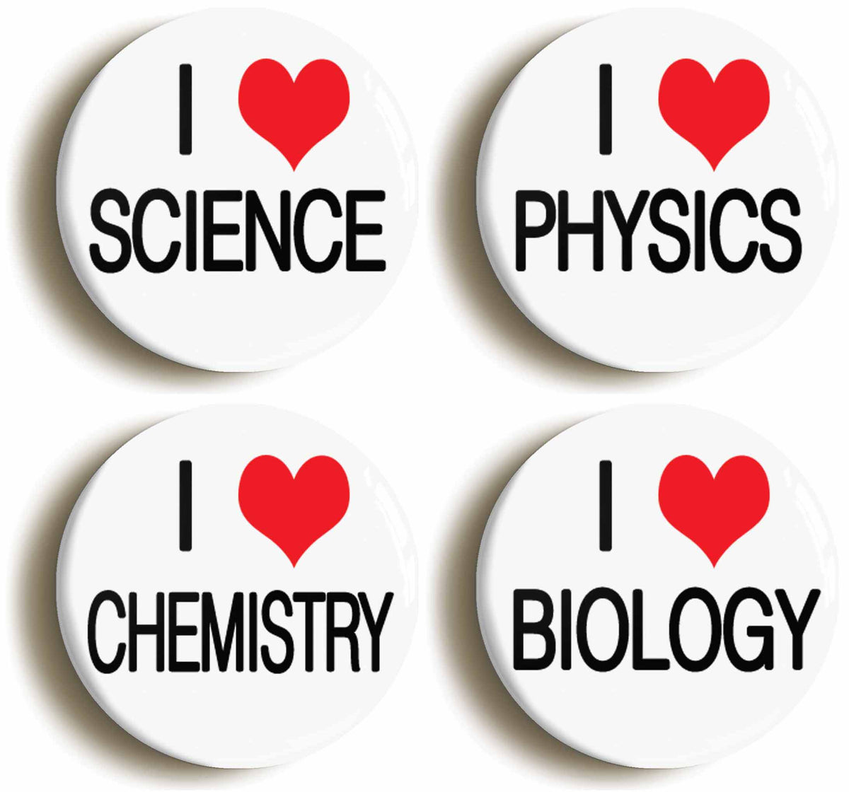 A picture of a set of four badges
