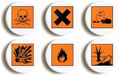 A picture of a set of six badges
