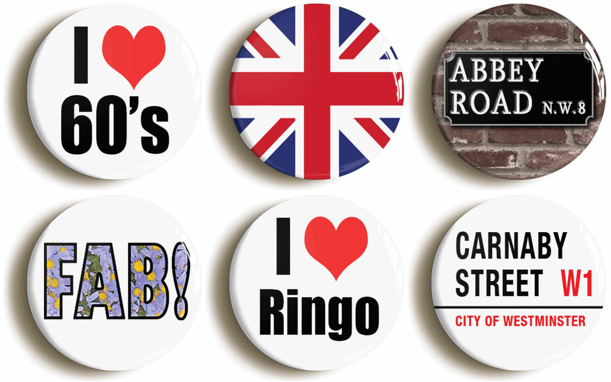 A picture of a set of six badges