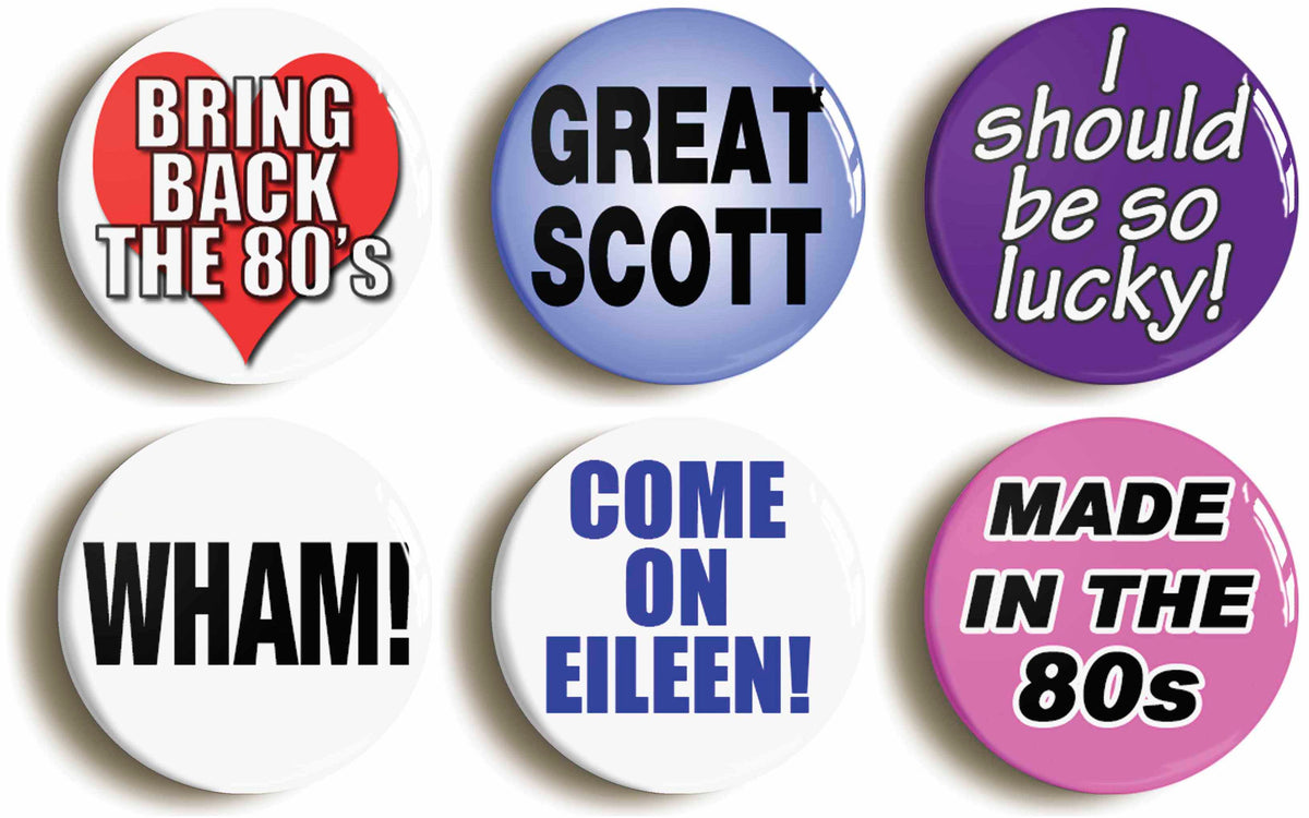 A picture of a set of six badges