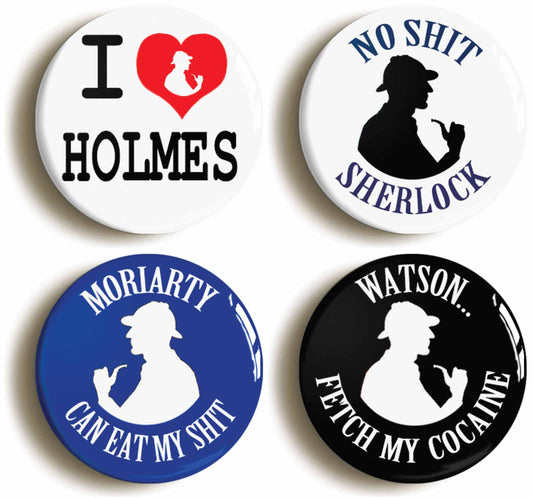 A picture of a set of four badges