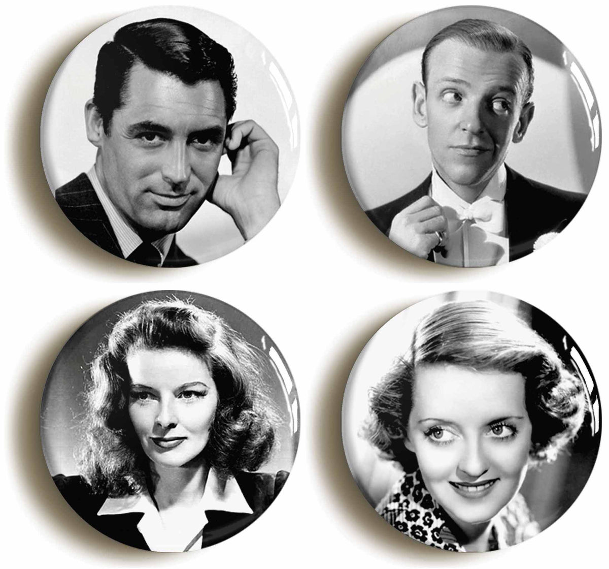 A picture of a set of four badges