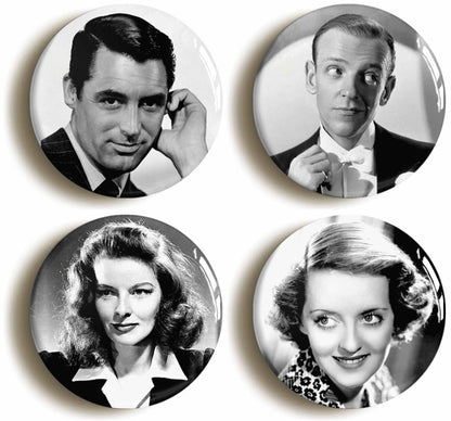 A picture of a set of four badges
