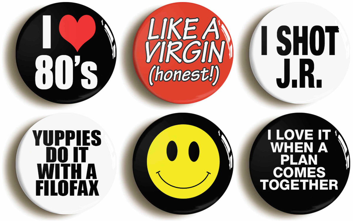 A picture of a set of six badges