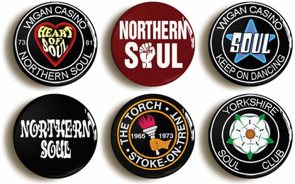 A picture of a set of six badges
