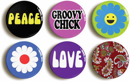 A picture of a set of six badges