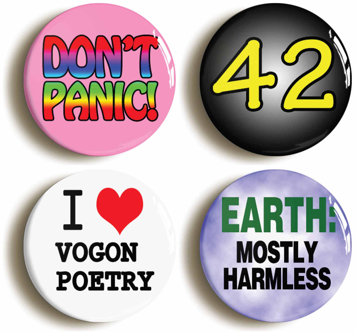 A picture of a set of four badges