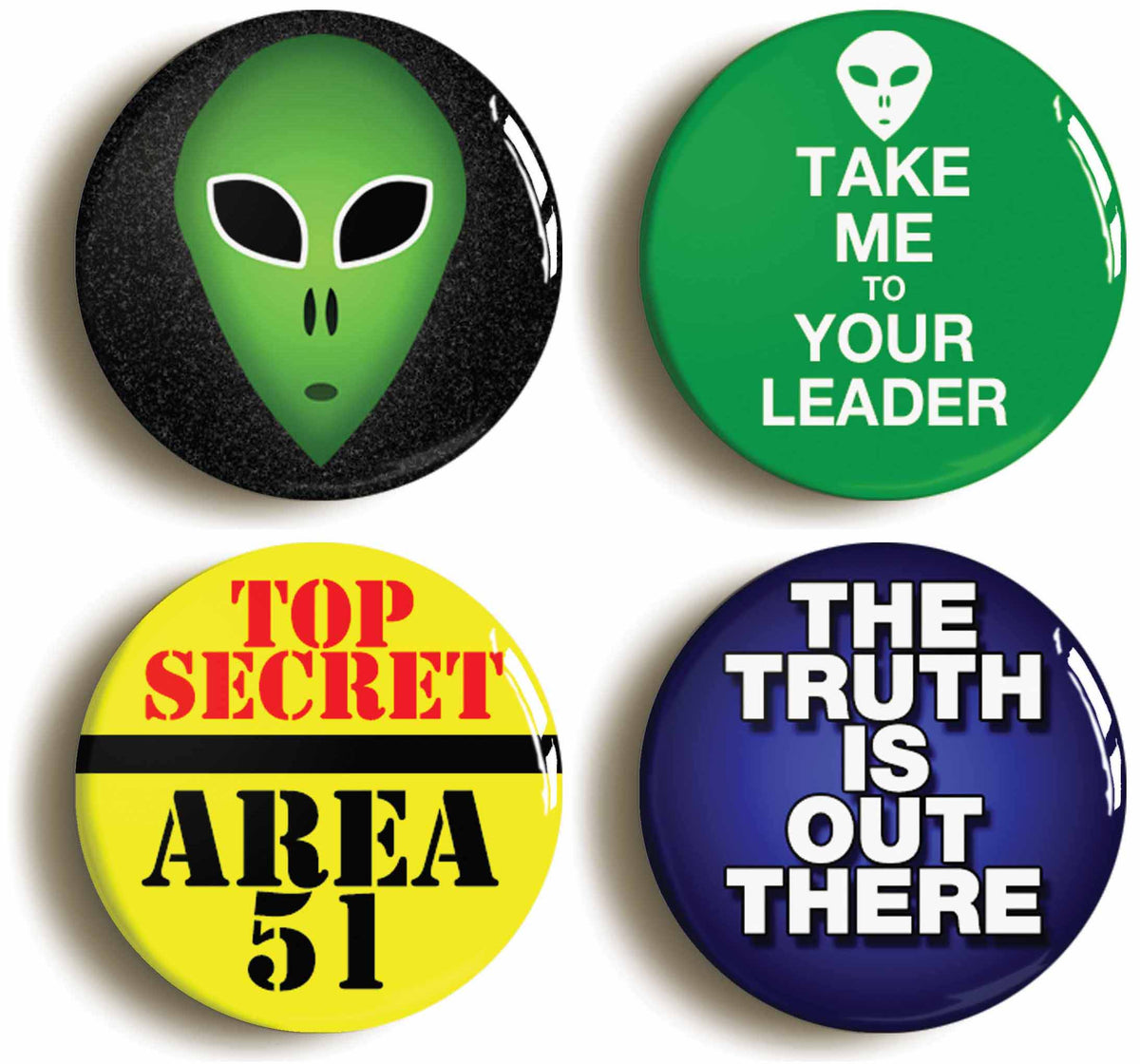 A picture of a set of four badges