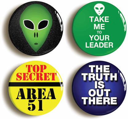 A picture of a set of four badges