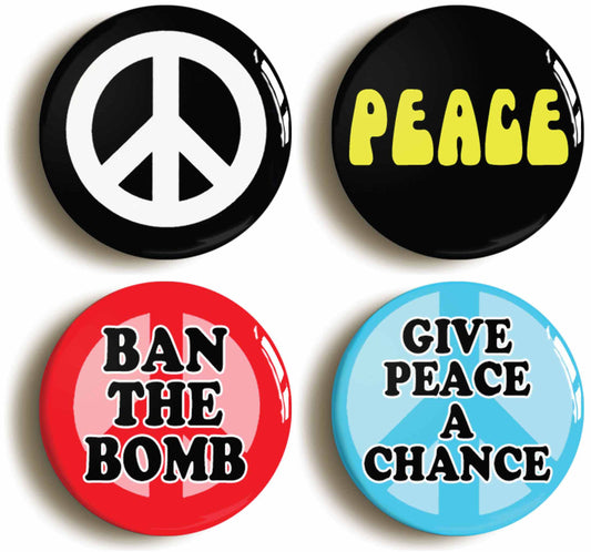 A picture of a set of four badges