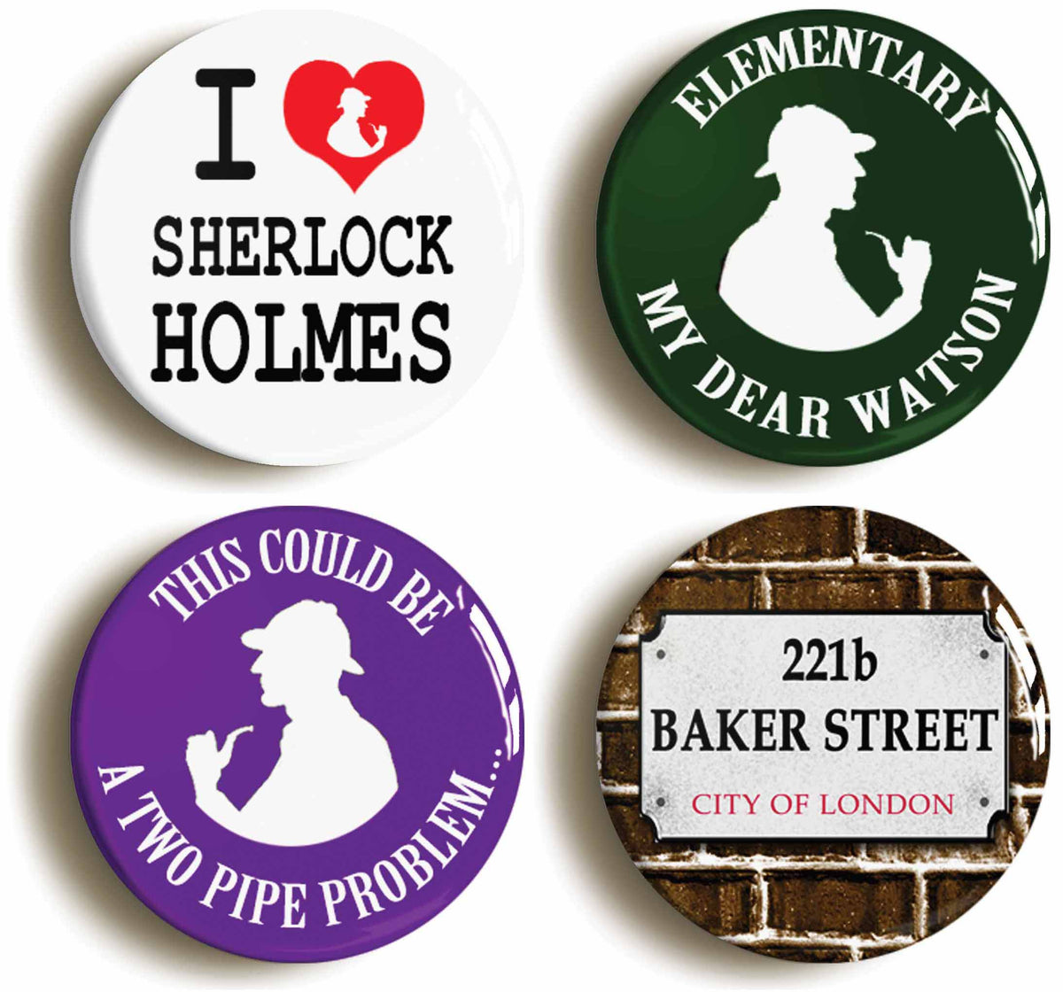 A picture of a set of four badges
