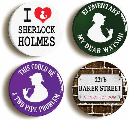 A picture of a set of four badges