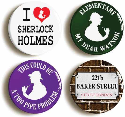 A picture of a set of four badges