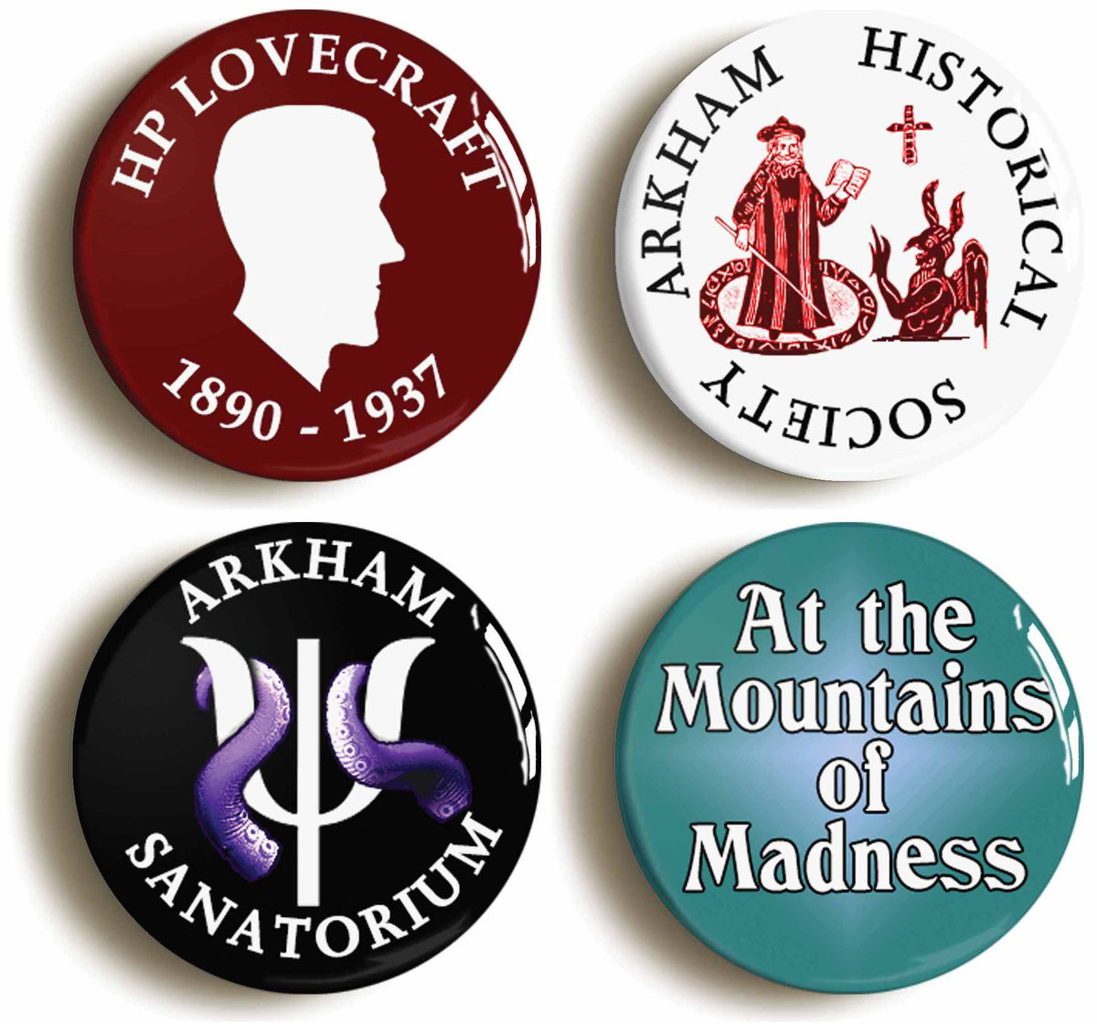 A picture of a set of four badges