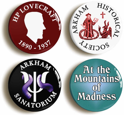 A picture of a set of four badges