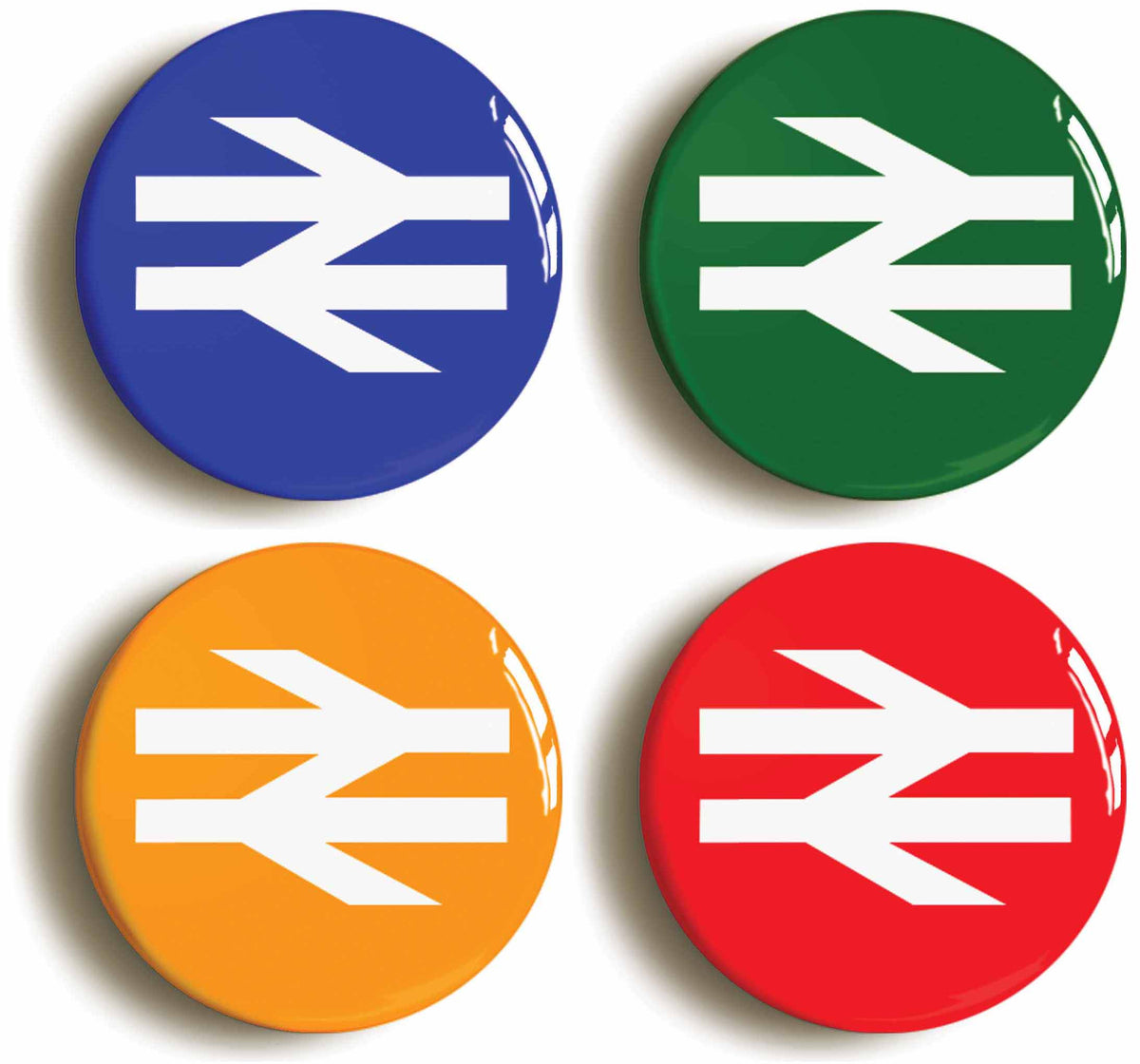 A picture of a set of four badges