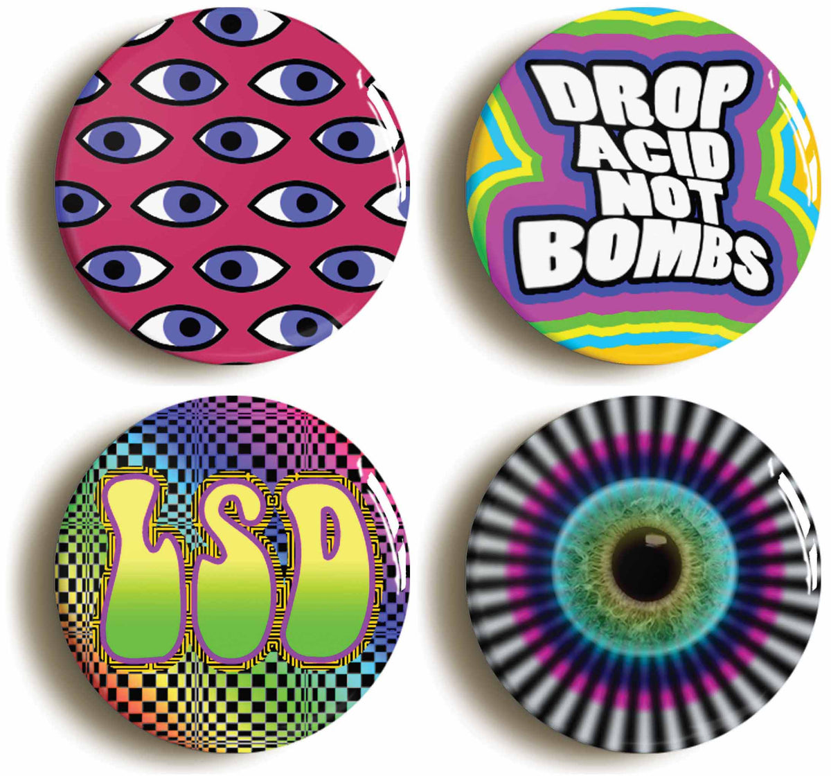 A picture of a set of four badges