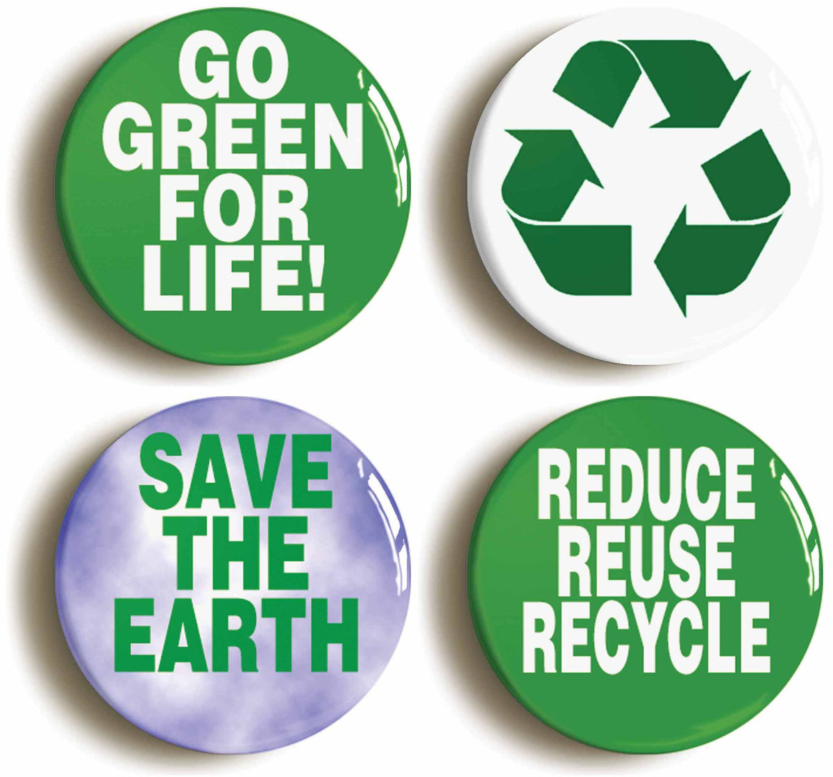 A picture of a set of four badges