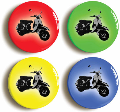 A picture of a set of four badges