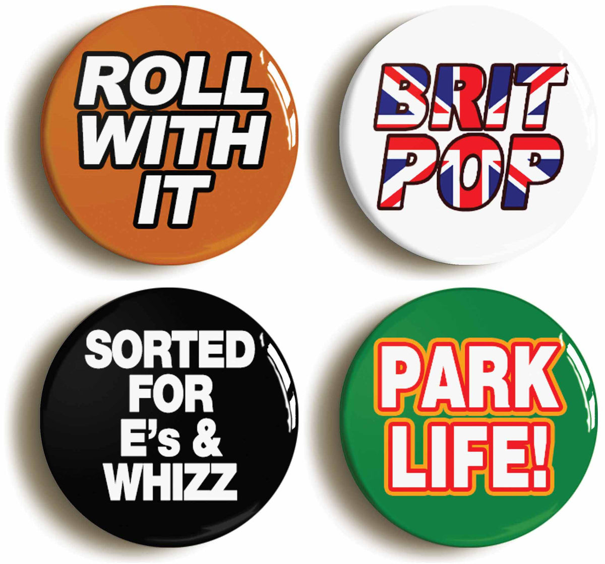 A picture of a set of four badges