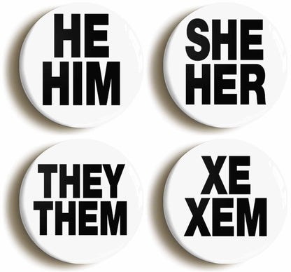 A picture of a set of four badges