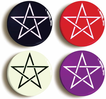 A picture of a set of four badges