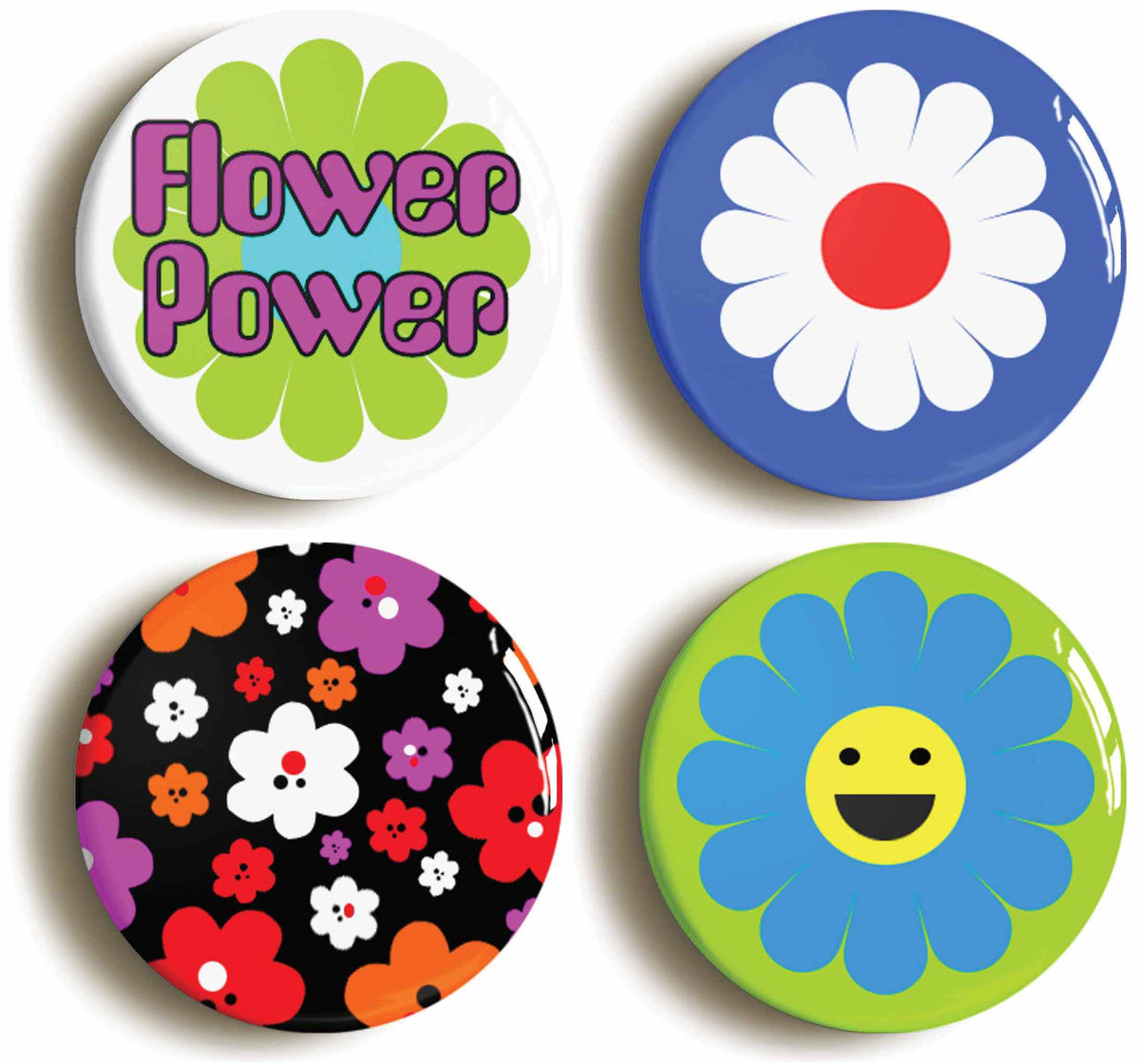 A picture of a set of four badges