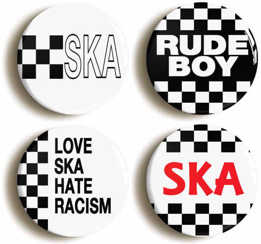 A picture of a set of four badges