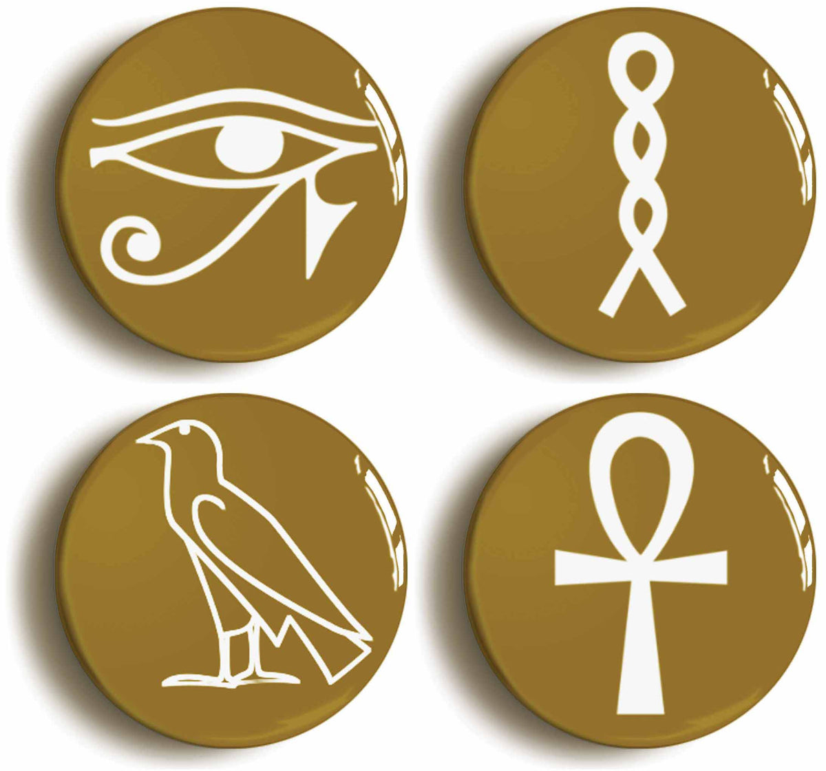 A picture of a set of four badges