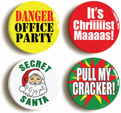 A picture of a set of four badges