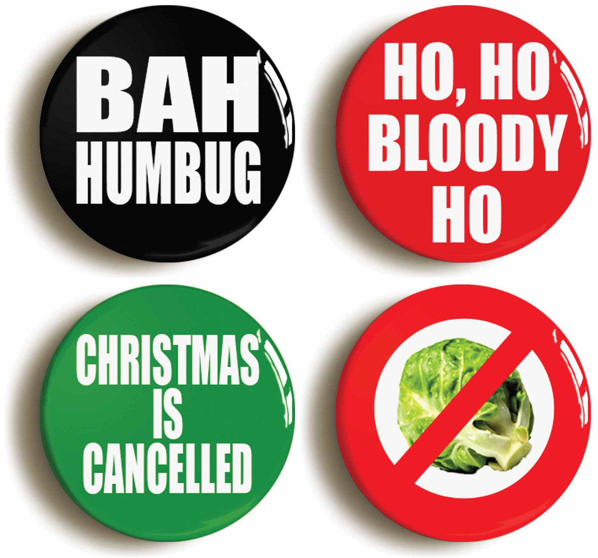 A picture of a set of four badges