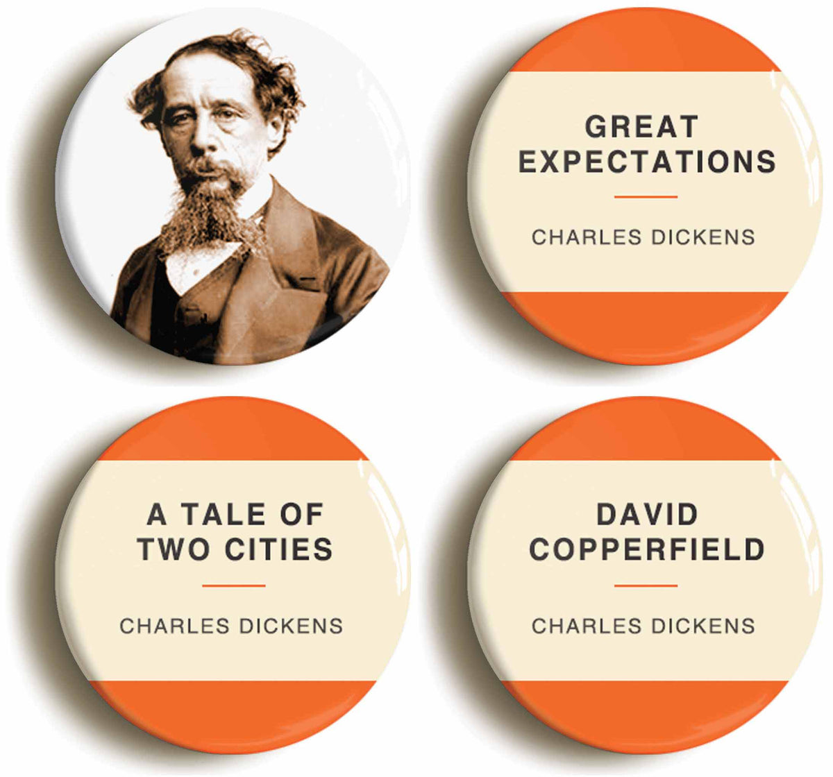 A picture of a set of four badges