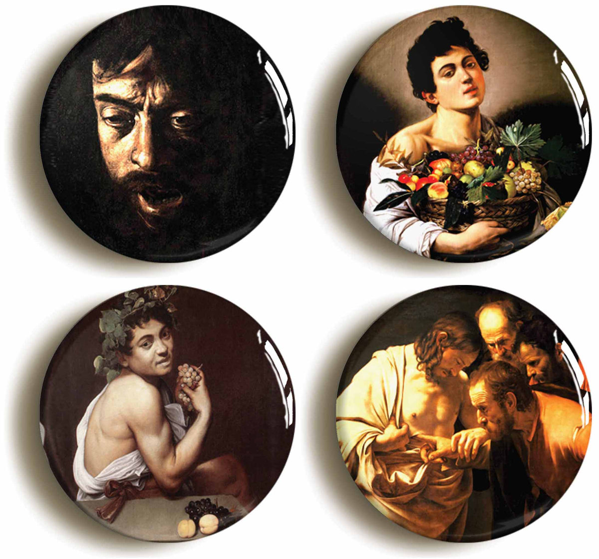 A picture of a set of four badges